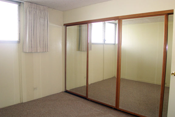 Master Bedroom with Mirrored Closets