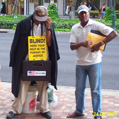Street Beggars on Kalakuaa Ave Sidewalk
