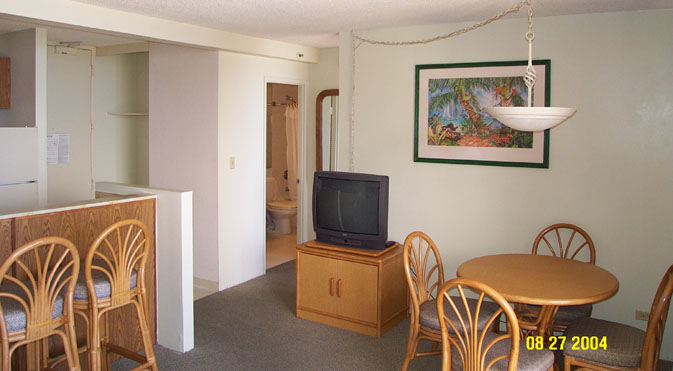 Dining area, large screen TV, and into the separate bathroom.